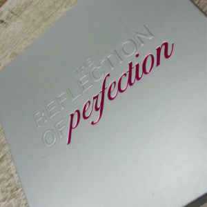 Cerise pink foil with embossing