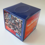 Cube-shaped tissue box with full-color photographic print and gloss finish.